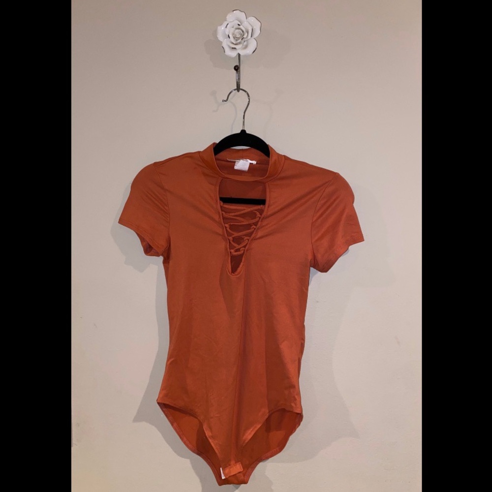 Orange lace up bodysuit!